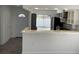 Modern kitchen featuring a breakfast bar and updated countertops at 513 Harvard Pl, Apopka, FL 32703
