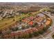 Aerial view of condo community, showing building location, pool, and parking at 533 Villa Del Sol Cir # 103, Orlando, FL 32824