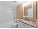 Clean bathroom with tub, shower, and granite vanity at 533 Villa Del Sol Cir # 103, Orlando, FL 32824