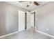 Bedroom with tile floors, closet, and access to bathroom at 540 Fern Ave, Tavares, FL 32778