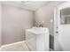 Laundry room with washer, dryer, and exterior access at 540 Fern Ave, Tavares, FL 32778