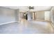 Open living area with tile floors and lots of natural light at 540 Fern Ave, Tavares, FL 32778