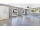 Living room with tile floors and a view of the front yard at 540 Fern Ave, Tavares, FL 32778