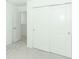Spacious bedroom with double door closet and access to another room at 5701 Le Marin Way, Kissimmee, FL 34758