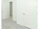 Empty bedroom with carpet and two doors at 5701 Le Marin Way, Kissimmee, FL 34758