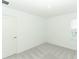 Bright bedroom with neutral walls and carpet at 5701 Le Marin Way, Kissimmee, FL 34758