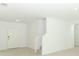 Bright entryway with staircase and front door at 5701 Le Marin Way, Kissimmee, FL 34758