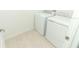 Laundry room with washer and dryer included at 5701 Le Marin Way, Kissimmee, FL 34758