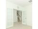 Spacious office with French doors opening to the staircase at 5701 Le Marin Way, Kissimmee, FL 34758