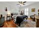 Cozy bedroom with a vintage feel and hardwood floors at 606 E Amelia St, Orlando, FL 32803