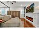 Main bedroom with fireplace, TV, and large walk-in closet at 606 E Amelia St, Orlando, FL 32803