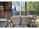 Enjoy dining alfresco on this patio with a wooden table and chairs at 606 E Amelia St, Orlando, FL 32803