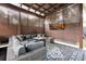 Covered patio with seating area and fire pit at 606 E Amelia St, Orlando, FL 32803