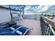 Outdoor balcony with lounge chairs and city views at 6165 Carrier Dr # 3707, Orlando, FL 32819