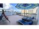 Spacious balcony offering city views and seating at 6165 Carrier Dr # 3707, Orlando, FL 32819