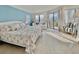 Bedroom with a king-size bed and city views at 6165 Carrier Dr # 3707, Orlando, FL 32819