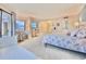 King bed, city views and day bed in this bedroom at 6165 Carrier Dr # 3707, Orlando, FL 32819