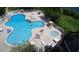 Relaxing pool area with plenty of space for sunbathing at 6165 Carrier Dr # 3707, Orlando, FL 32819