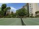 Well-maintained tennis court for residents at 6165 Carrier Dr # 3707, Orlando, FL 32819