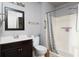 Bathroom with shower/tub combo, vanity, and grab bars at 741 Caribou Dr, Kissimmee, FL 34759