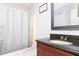 Clean bathroom with granite countertop and tub at 741 Caribou Dr, Kissimmee, FL 34759