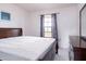 Bright bedroom with double bed and window at 741 Caribou Dr, Kissimmee, FL 34759