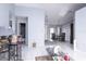 Bright living room with tile floors and a view into the dining area at 741 Caribou Dr, Kissimmee, FL 34759