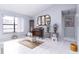 Living room with tiled floors, glass coffee table, and mirrors at 741 Caribou Dr, Kissimmee, FL 34759