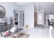 Living area with tiled floors and access to other rooms at 741 Caribou Dr, Kissimmee, FL 34759