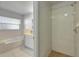 Bathroom with bathtub, shower, and vanity at 849 Jarnac Dr, Kissimmee, FL 34759