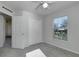 Bedroom features neutral walls, carpet, and window at 849 Jarnac Dr, Kissimmee, FL 34759
