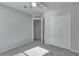 Bedroom with neutral walls, carpet, and double doors at 849 Jarnac Dr, Kissimmee, FL 34759