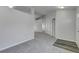 Clean hallway with gray carpet and neutral walls at 849 Jarnac Dr, Kissimmee, FL 34759