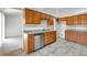 Kitchen features wood cabinets and granite countertops at 849 Jarnac Dr, Kissimmee, FL 34759