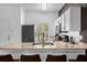 Well-equipped kitchen featuring granite counters and white cabinets at 1041 Las Fuentes Dr, Kissimmee, FL 34746
