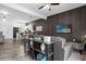 Living area showcasing an open floor plan and kitchen access at 1041 Las Fuentes Dr, Kissimmee, FL 34746