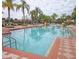 Sparkling community pool with spacious deck at 1041 Las Fuentes Dr, Kissimmee, FL 34746