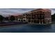 Elegant mixed-use buildings by the water featuring retail and apartments offering a blend of lifestyle and commerce at 1112 Sarah Mathews Dr, Oakland, FL 34787