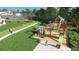 Fun playground area for children surrounded by green spaces perfect for outdoor activities within the community at 1112 Sarah Mathews Dr, Oakland, FL 34787