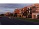 Inviting street view showcasing modern mixed-use buildings with retail and residences perfect for urban living and convenience at 1112 Sarah Mathews Dr, Oakland, FL 34787
