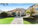 Luxury home with tile roof and landscaped yard, in upscale neighborhood at 1519 Lake Rhea Dr, Windermere, FL 34786