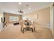 Spacious basement with seating area and a small dining table at 1519 Lake Rhea Dr, Windermere, FL 34786