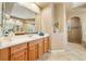 Elegant bathroom with double vanity and walk-in shower at 1519 Lake Rhea Dr, Windermere, FL 34786