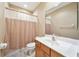 Clean bathroom with shower/tub combo and updated vanity at 1519 Lake Rhea Dr, Windermere, FL 34786
