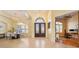 Spacious entryway with double doors and adjacent home office at 1519 Lake Rhea Dr, Windermere, FL 34786