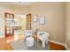 Bright home office features wood floors and French doors at 1519 Lake Rhea Dr, Windermere, FL 34786