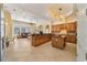 Spacious kitchen boasts granite counters and island at 1519 Lake Rhea Dr, Windermere, FL 34786