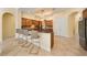 Kitchen with breakfast bar, island, and stainless steel appliances at 1519 Lake Rhea Dr, Windermere, FL 34786