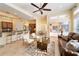Open living area with leather sofa and adjacent kitchen at 1519 Lake Rhea Dr, Windermere, FL 34786
