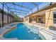 Large, screened pool and spa, perfect for relaxation at 1519 Lake Rhea Dr, Windermere, FL 34786